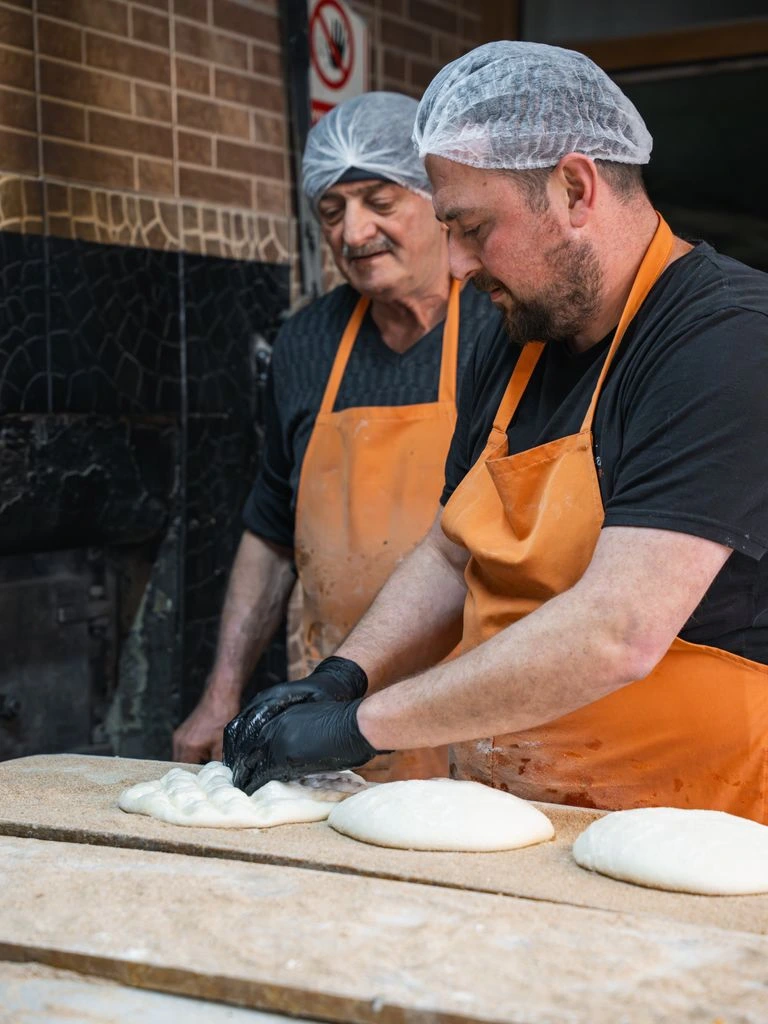 Founder Jack Marlow shaping dough in his Nashville home kitchen